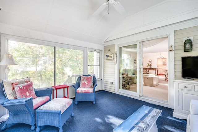 sunroom with vaulted ceiling and ceiling fan