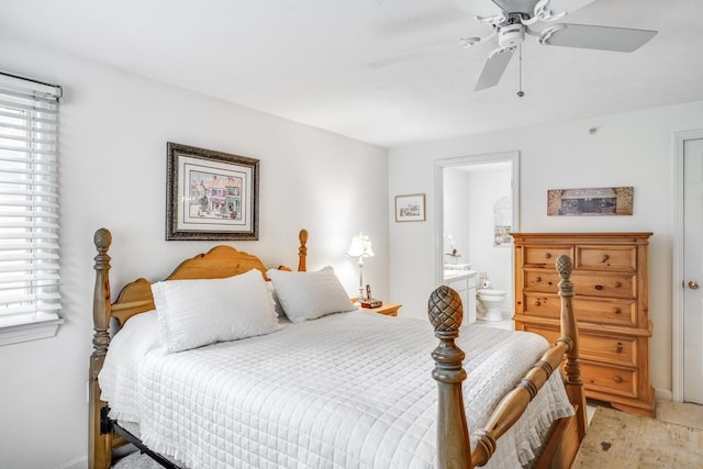 bedroom featuring ceiling fan and ensuite bathroom