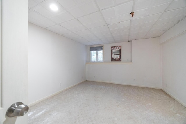 unfurnished room featuring baseboards and carpet floors