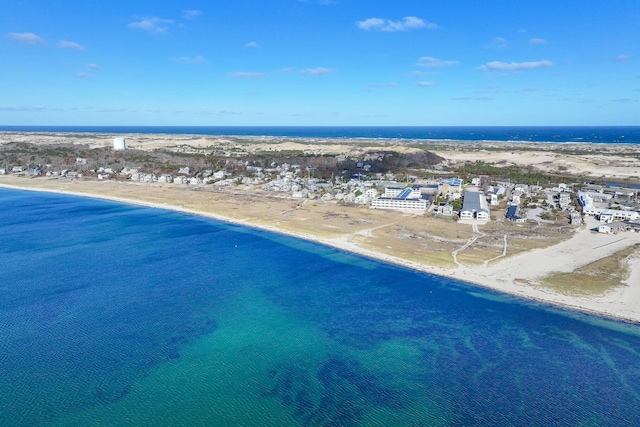 bird's eye view with a view of the beach and a water view