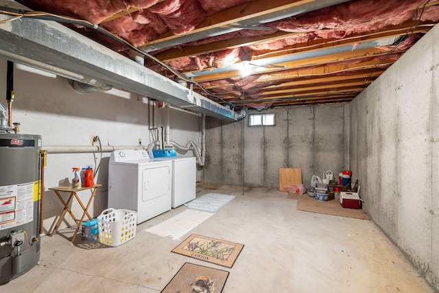 below grade area with water heater and washer and clothes dryer