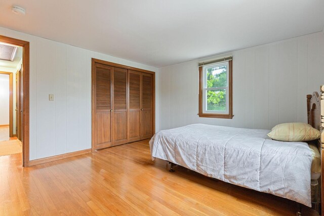 7 Bittersweet Ln, South Dennis, MA 02660 - single story home with an attached garage, a chimney, and aphalt driveway