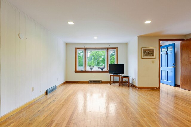7 Bittersweet Ln, South Dennis, MA 02660 - living room with baseboards, wood finished floors, a fireplace, and recessed lighting