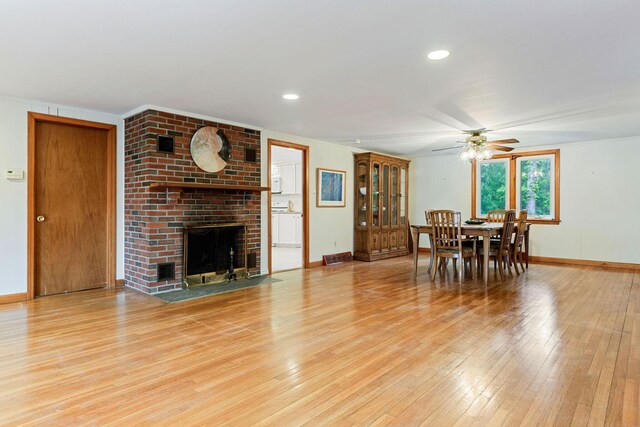 7 Bittersweet Ln, South Dennis, MA 02660 - kitchen with white appliances, light countertops, white cabinets, baseboards, and recessed lighting