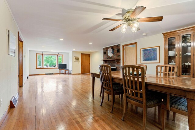 7 Bittersweet Ln, South Dennis, MA 02660 - bedroom featuring wooden walls and light wood-style flooring