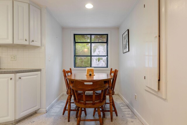 7 Bittersweet Ln, South Dennis, MA 02660 - kitchen featuring white cabinets, light countertops, backsplash, and white appliances