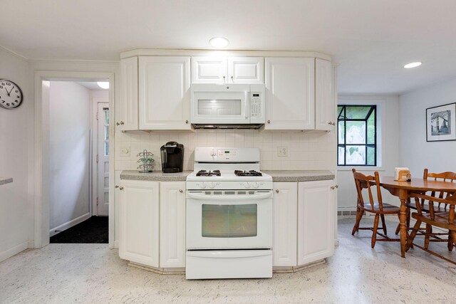 7 Bittersweet Ln, South Dennis, MA 02660 - full bathroom with tile walls, a wainscoted wall, vanity, and toilet