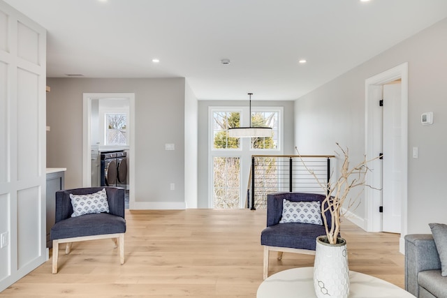 179 Beebe Acres Rd, Falmouth, MA 02540 - sitting room featuring recessed lighting, baseboards, light wood finished floors, and washer and dryer