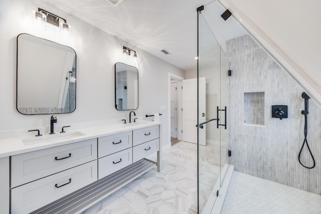 179 Beebe Acres Rd, Falmouth, MA 02540 - bathroom featuring double vanity, a shower stall, visible vents, and a sink