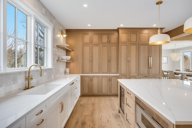 179 Beebe Acres Rd, Falmouth, MA 02540 - kitchen with a sink, tasteful backsplash, recessed lighting, pendant lighting, and open shelves