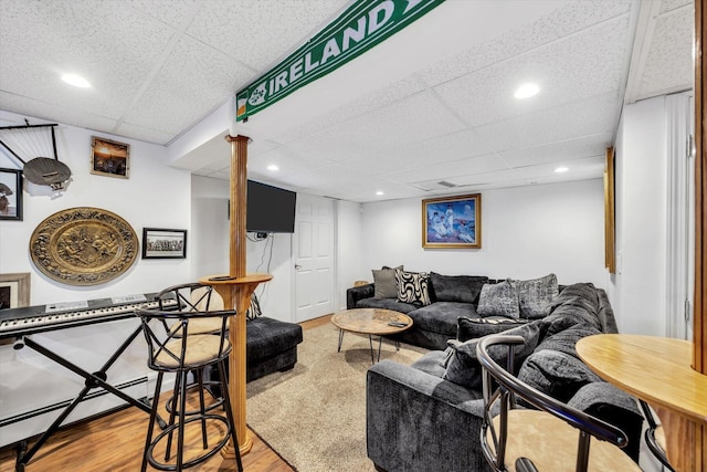11 Elizabeth Ln, West Yarmouth, MA 02673 - living room featuring recessed lighting, a paneled ceiling, and wood finished floors