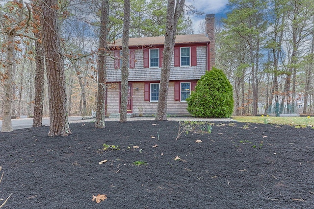 130 Surrey Ln, Brewster, MA 02631 - colonial home with a chimney