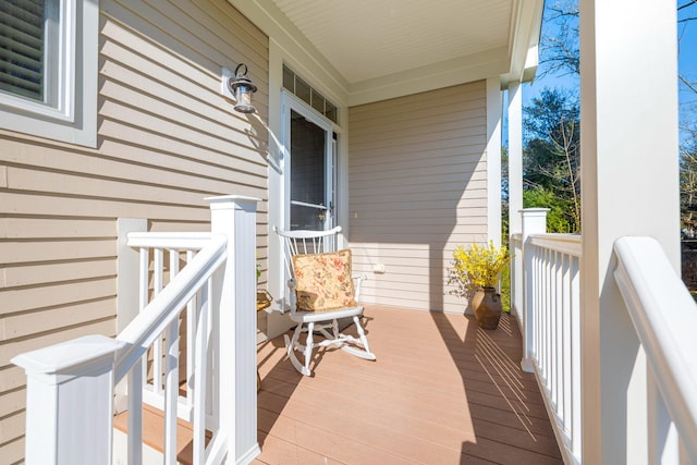 wooden deck featuring a porch