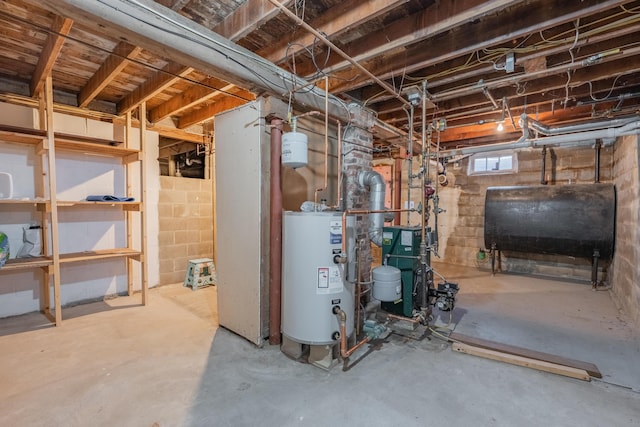 below grade area featuring heating fuel, water heater, and a heating unit