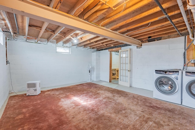 basement featuring washer and dryer