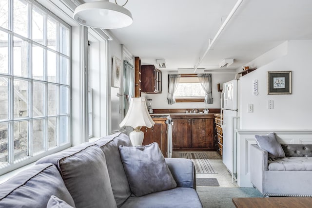 kitchen featuring sink and white refrigerator