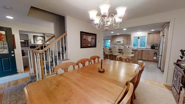 dining room with a notable chandelier