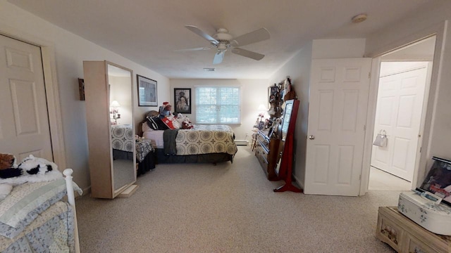 carpeted bedroom featuring ceiling fan