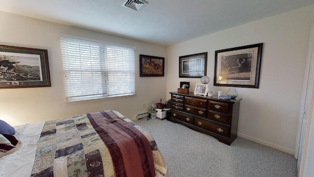 bedroom featuring a baseboard radiator and light carpet