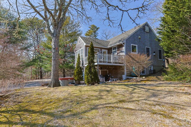 30 Pleasant Ct, Brewster, MA 02631 - rear view of house with a lawn and a wooden deck