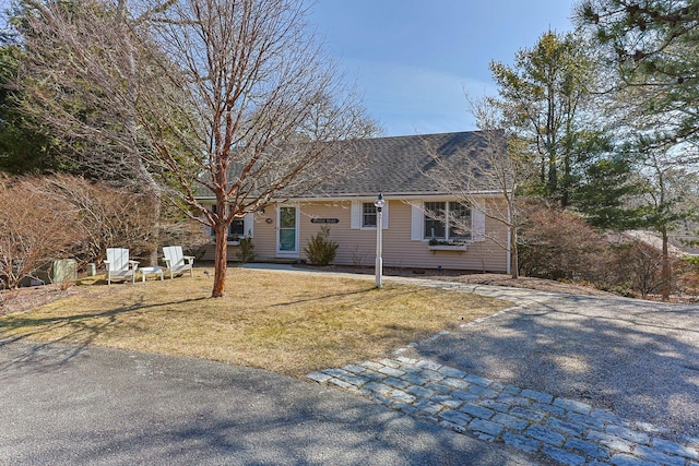 30 Pleasant Ct, Brewster, MA 02631 - view of front of house featuring roof with shingles, aphalt driveway, and a front yard