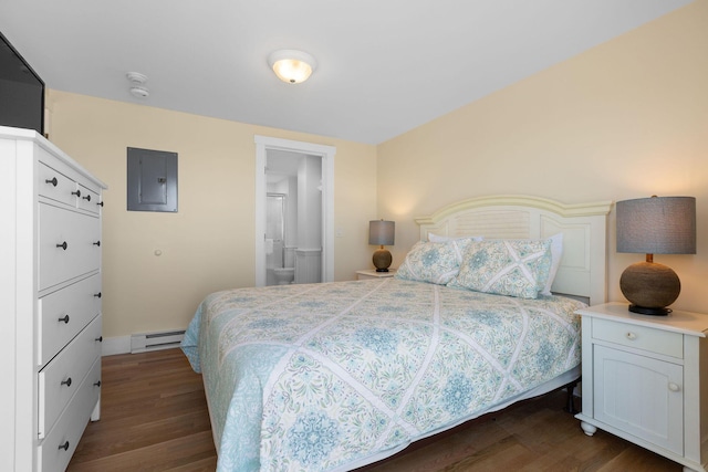 496 Shore Rd Unit 16, Truro, MA 02666 - bedroom featuring baseboard heating, dark wood-type flooring, connected bathroom, and electric panel