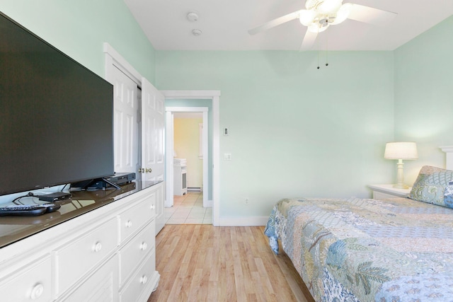 bedroom with ceiling fan and light wood-type flooring