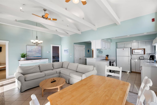 tiled living room with high vaulted ceiling, sink, ceiling fan with notable chandelier, and beam ceiling