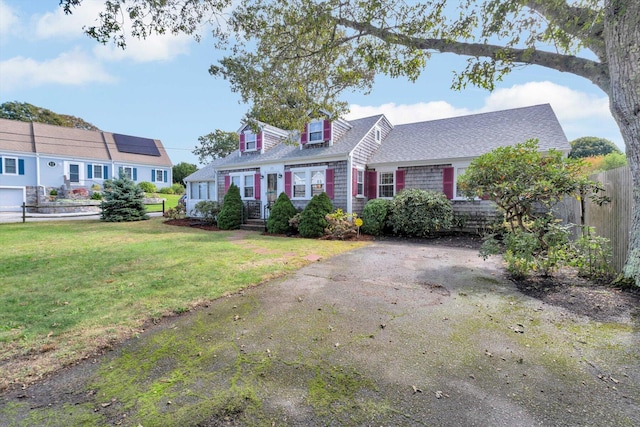 view of front of home with a front yard