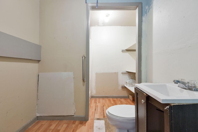 91 Baxter Rd, Hyannis, MA 02601 - full bath with wood finished floors, toilet, vanity, and a shower
