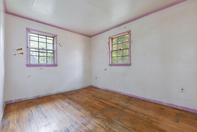 91 Baxter Rd, Hyannis, MA 02601 - unfurnished room with ornamental molding, hardwood / wood-style floors, and baseboards