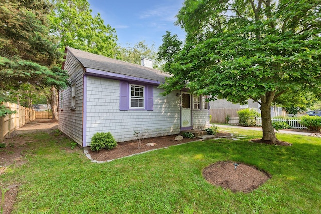 91 Baxter Rd, Hyannis, MA 02601 - view of front of house featuring a chimney, roof with shingles, and entry steps