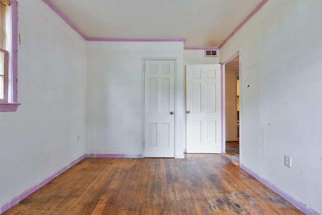 91 Baxter Rd, Hyannis, MA 02601 - unfurnished bedroom with ornamental molding, hardwood / wood-style floors, and baseboards