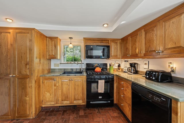 kitchen with black appliances, a sink, brown cabinets, brick flooring, and decorative light fixtures