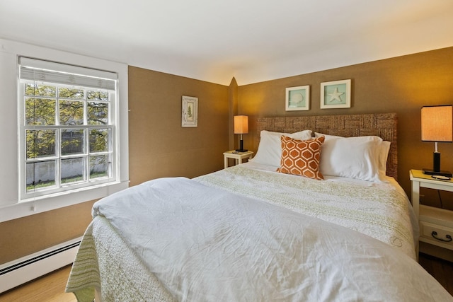 bedroom featuring a baseboard radiator