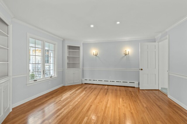 living room featuring wood-type flooring, ornamental molding, and french doors