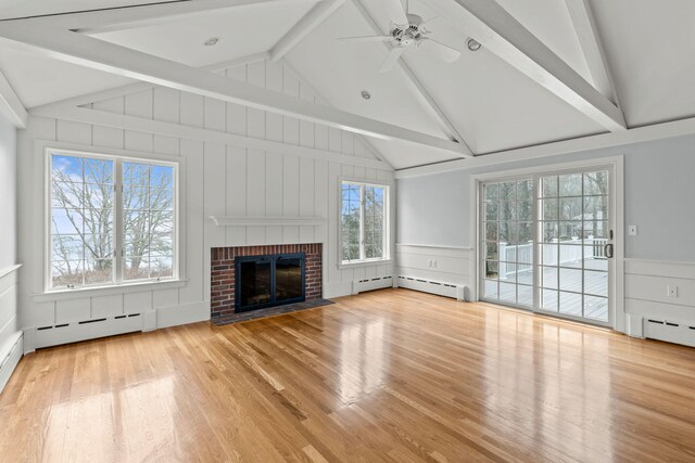 living room featuring ornamental molding and light hardwood / wood-style floors