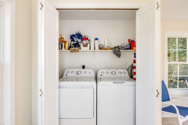 38 Rainbow Way, Harwich, MA 02645 - clothes washing area featuring a healthy amount of sunlight, washing machine and clothes dryer, and laundry area