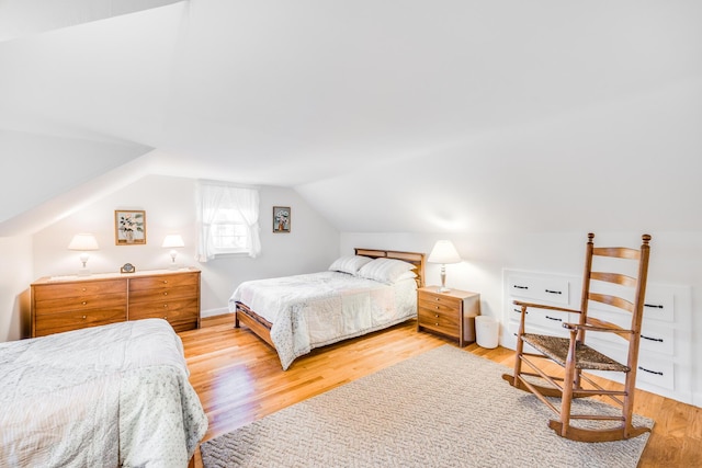 38 Rainbow Way, Harwich, MA 02645 - bedroom featuring lofted ceiling and light wood finished floors