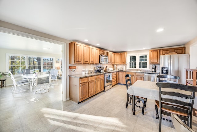 38 Rainbow Way, Harwich, MA 02645 - kitchen featuring decorative backsplash, appliances with stainless steel finishes, a sink, and recessed lighting