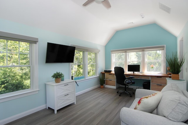 home office with hardwood / wood-style flooring, vaulted ceiling, ceiling fan, and a healthy amount of sunlight