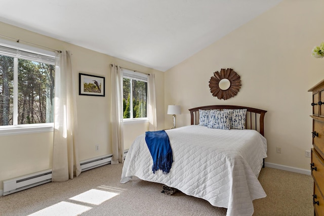 bedroom featuring baseboards, carpet, vaulted ceiling, and baseboard heating