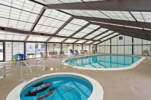 community pool featuring a patio area