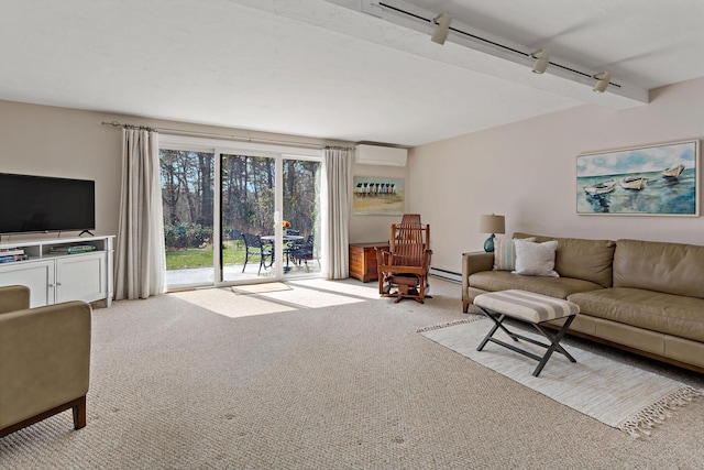 carpeted living area featuring rail lighting, a baseboard heating unit, and a wall unit AC