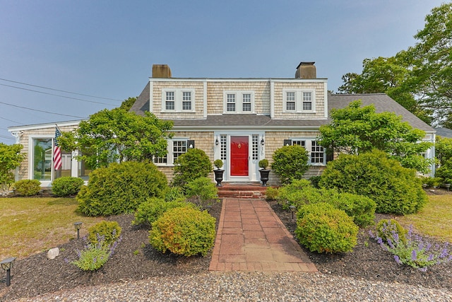 36 Uncle Barneys Rd, West Dennis, MA 02670 - view of front of property with a chimney