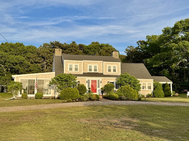 36 Uncle Barneys Rd, West Dennis, MA 02670 - shingle-style home with a chimney and a front lawn