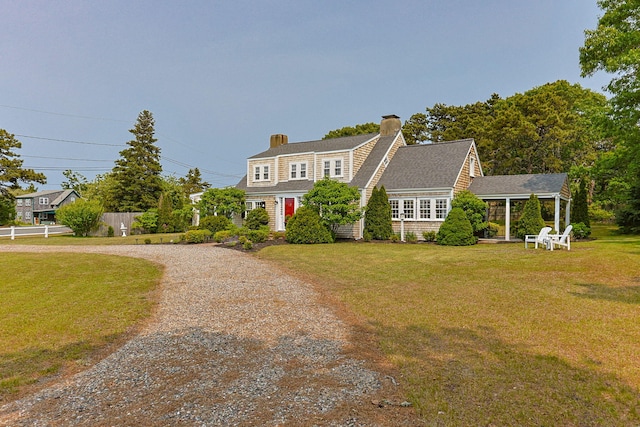 36 Uncle Barneys Rd, West Dennis, MA 02670 - shingle-style home with a chimney and curved driveway