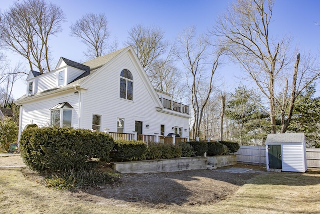 view of home's exterior featuring a storage unit