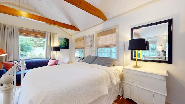 bedroom with wood ceiling and lofted ceiling with beams