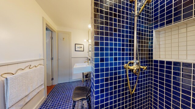 bathroom with tile patterned floors